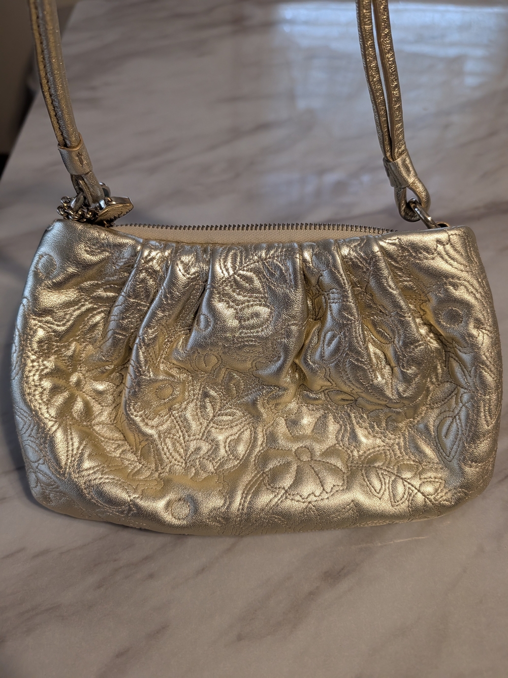 Bally Metallic Gold Floral Embossed Wristlet